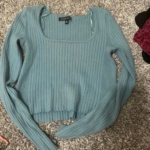 Small blue long sleeve shirt